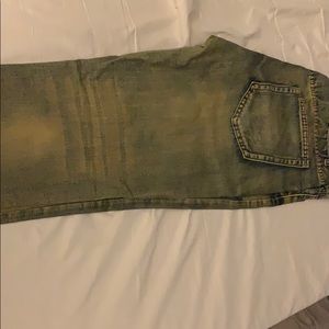 Distressed jeans ripped